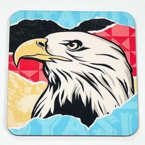 Black and white eagle against a red, black, yellow and blue background.